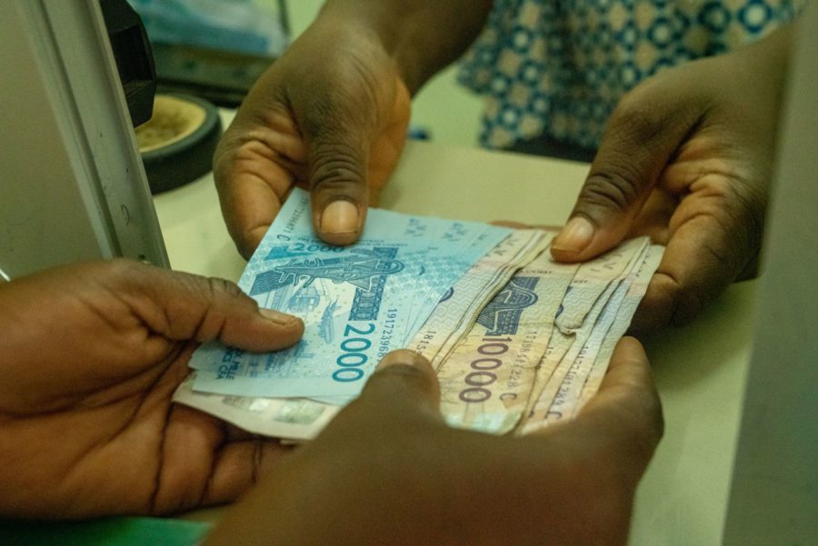 Bank notes exchanging hands