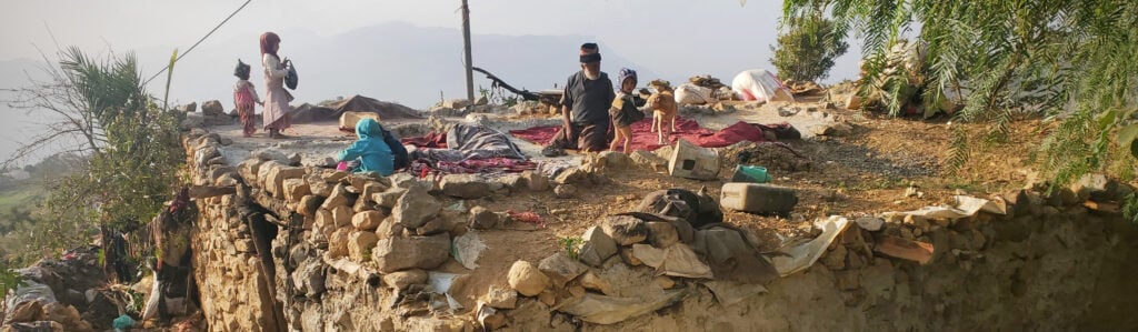 A Yemeni family on the roof of their home.